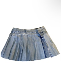 a denim skirt with pleas on it